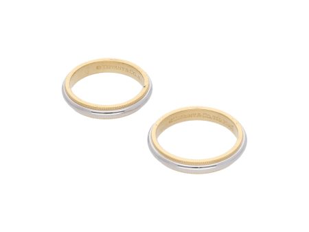 Dos argollas estriadas firma Tiffany & Co. en platino 950 y oro amarillo 18 kilates. Supply