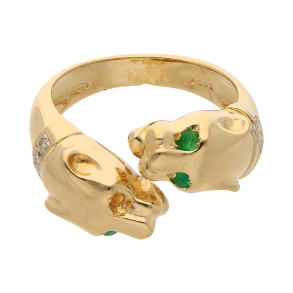 Anillo abierto con esmeraldas y diamantes motivo felinos en oro dos tonos 18 kilates. Online now