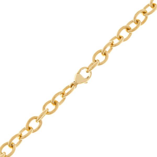 Gargantilla eslabón cruzado con pendiente motivo corazón firma Tiffany & Co. en oro amarillo 18 kilates. Online now