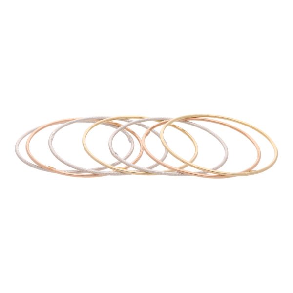 Siete pulsera de arillo lisas y labradas en oro tres tonos 14 kilates. Discount