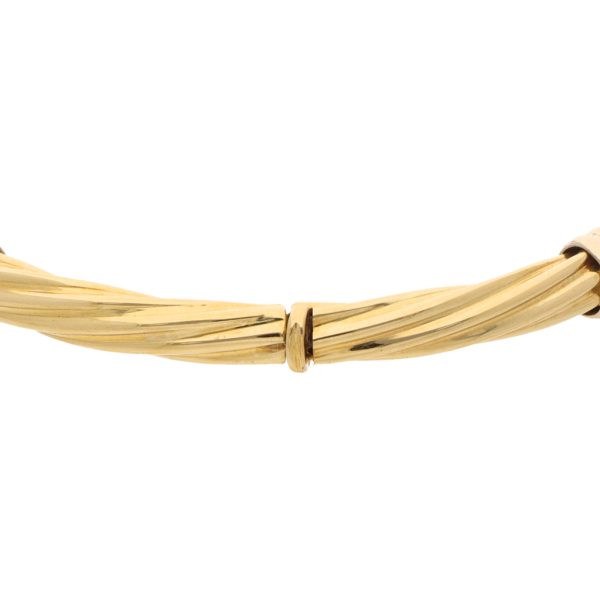 Pulsera de arillo articulada torzal en oro dos tonos 18 kilates. Discount