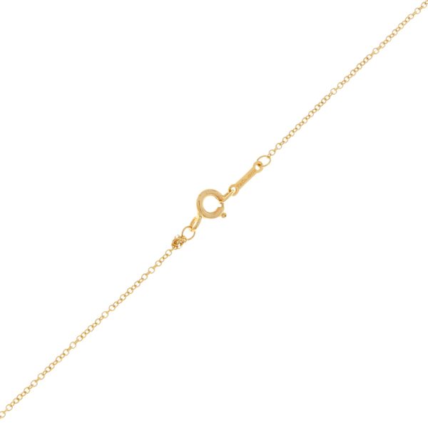 Gargantilla eslabón cruzado con dije motivo corazón firma Tiffany & Co. colección Paloma Picasso en oro amarillo 18 kilates. Online now