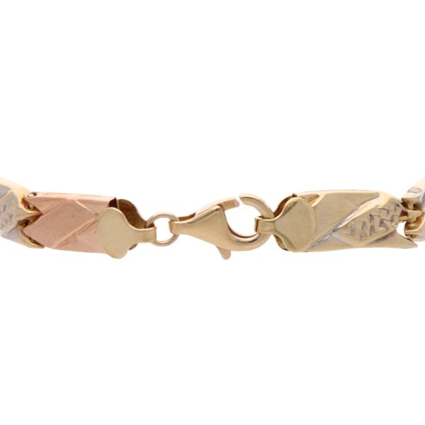 Pulsera hueca eslabón articulado en oro tres tonos 14 kilates. Online now