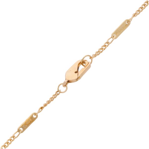 Collar de seis eslabones por uno con dije motivo manzana y pareja con diamantes, esmeralda y sintético firma Carrera y Carrera en oro amarillo 18 kilates. For Discount